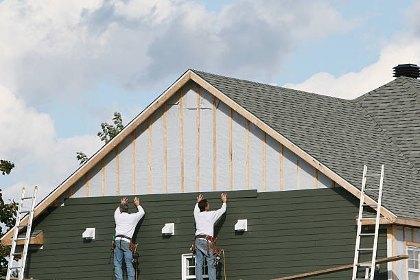 Professional Siding Replacement technician working in Merrick, NY